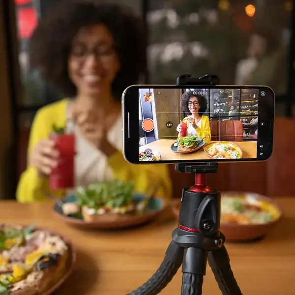 Woman Recording Social Media Campaign in her Restaurant